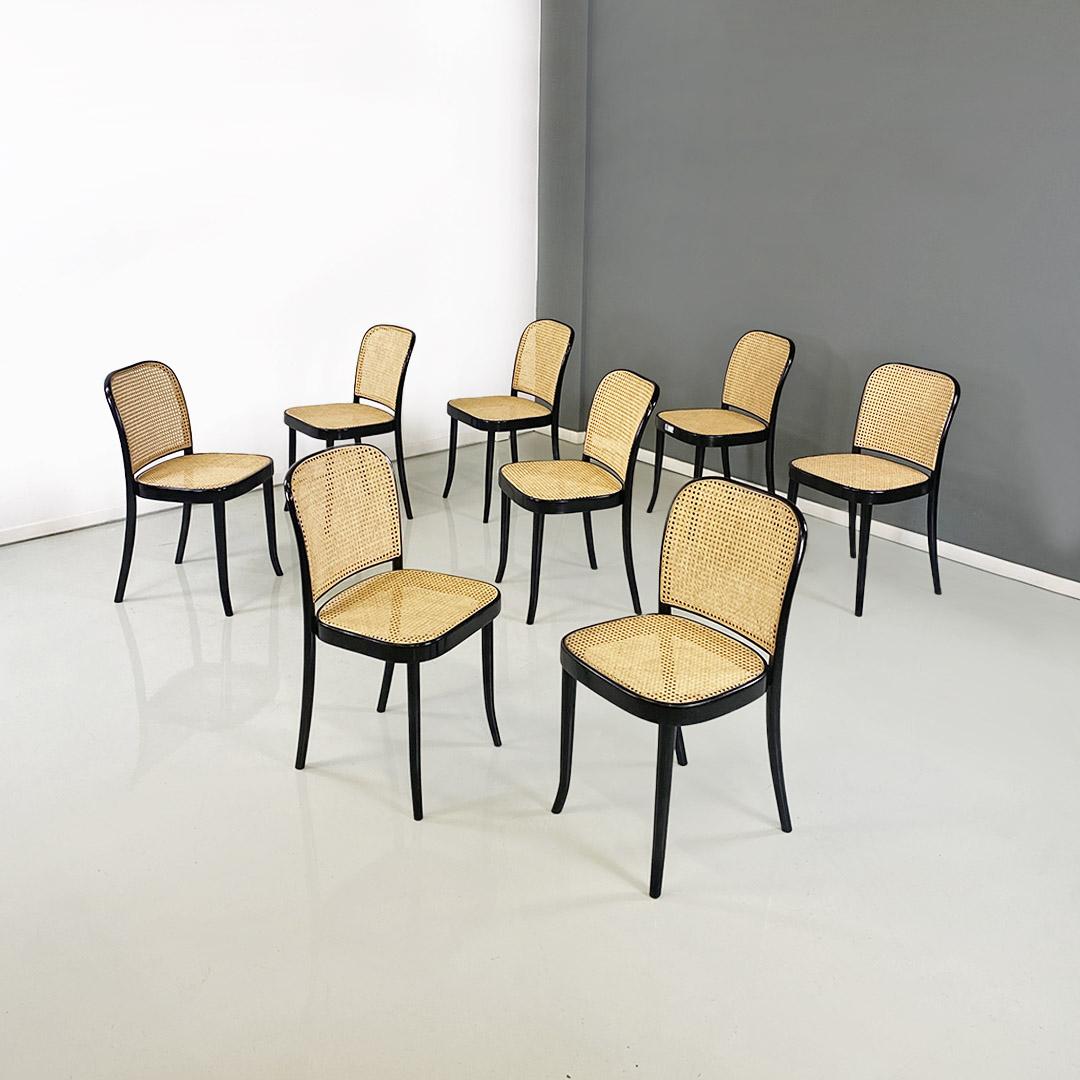 Ensemble de huit chaises avec assise et dossier aux angles arrondis en bois peint en noir et paille de Vienne, pieds ronds également en bois peint en noir.
Datant du début des années 1900 ca.
Bon état, chaque chaise présente de légères marques sur