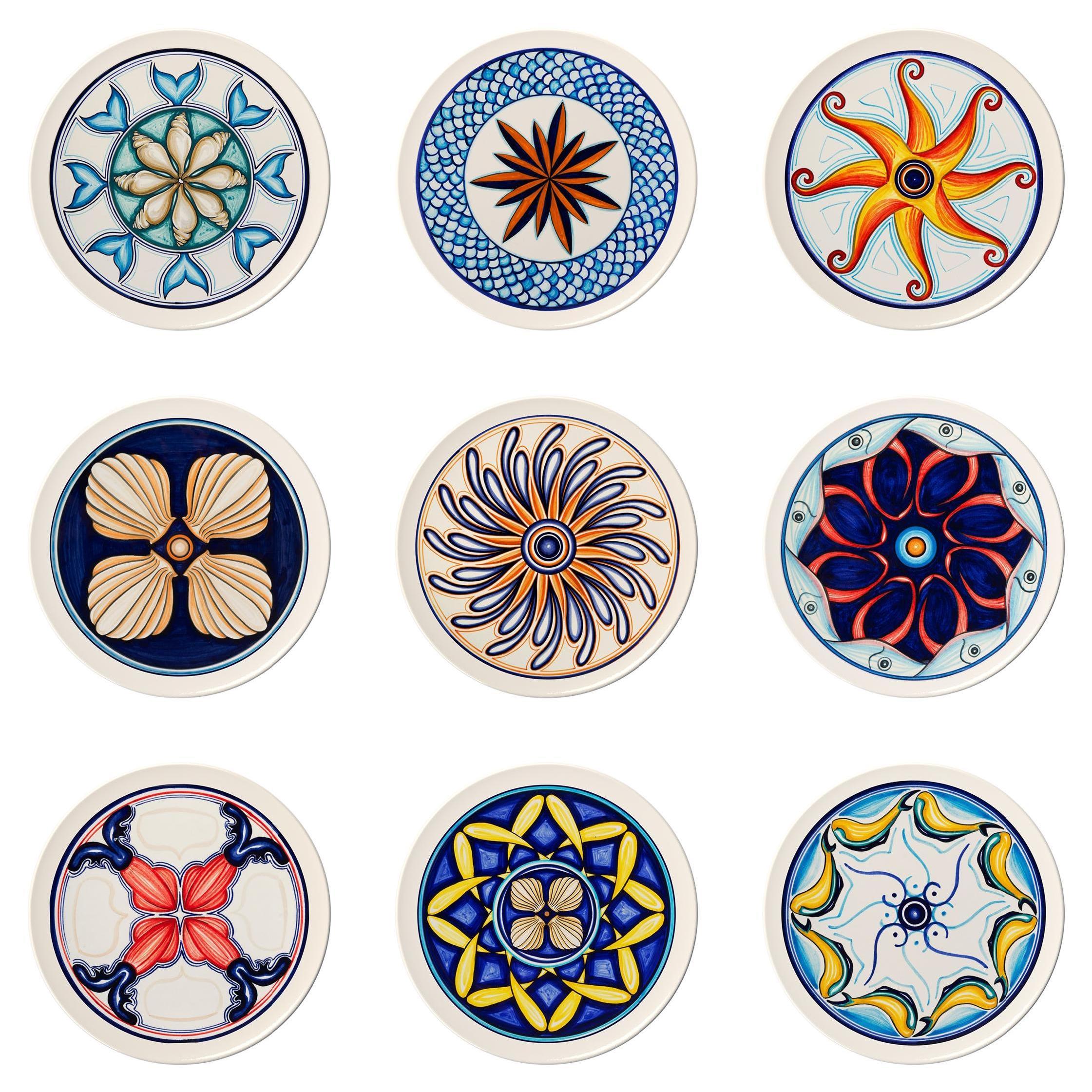Set of 9 ceramic collectible plates, interamante hand-painted. For Sale