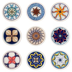 Set of 9 ceramic collectible plates, interamante hand-painted.