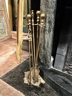 Set of gilded bronze fireplace tools, Italy