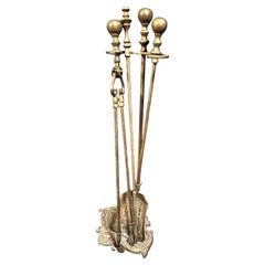 Set of gilded bronze fireplace tools, Italy