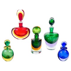 Set di cinque vasi, bottiglie in vetro soffiato di Murano. Anni 60
