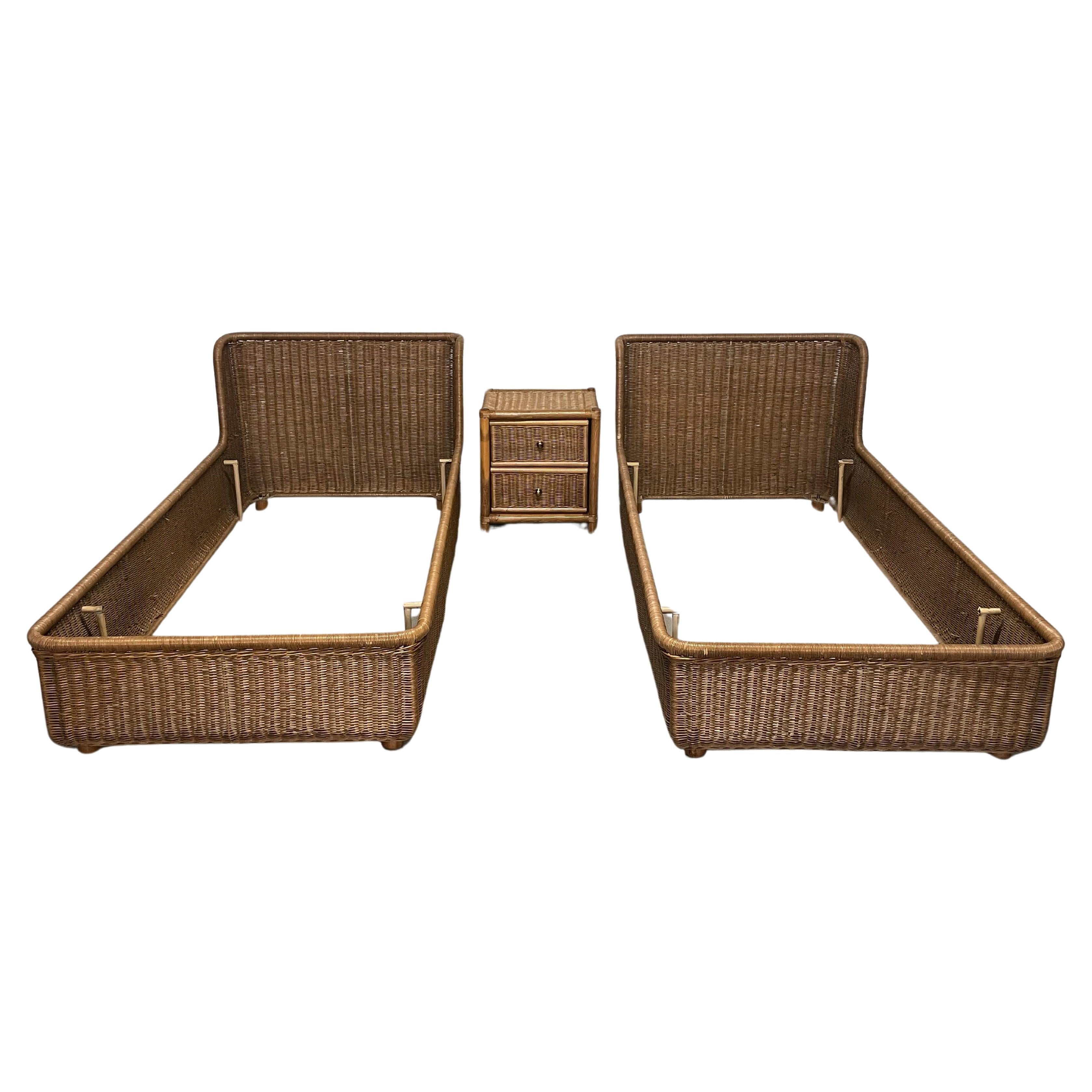 Set of two single beds with 80s rattan bedside table