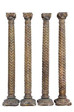 Set of four wooden columns, hand carved and gilded, Spain.
