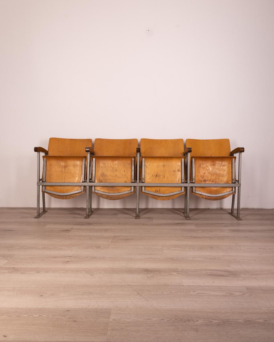 Set of four 1960s vintage movie theater chairs made of wood Italian