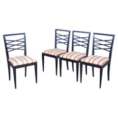 Set di quattro sedie di design italiano degli anni 40, in legno laccato nero