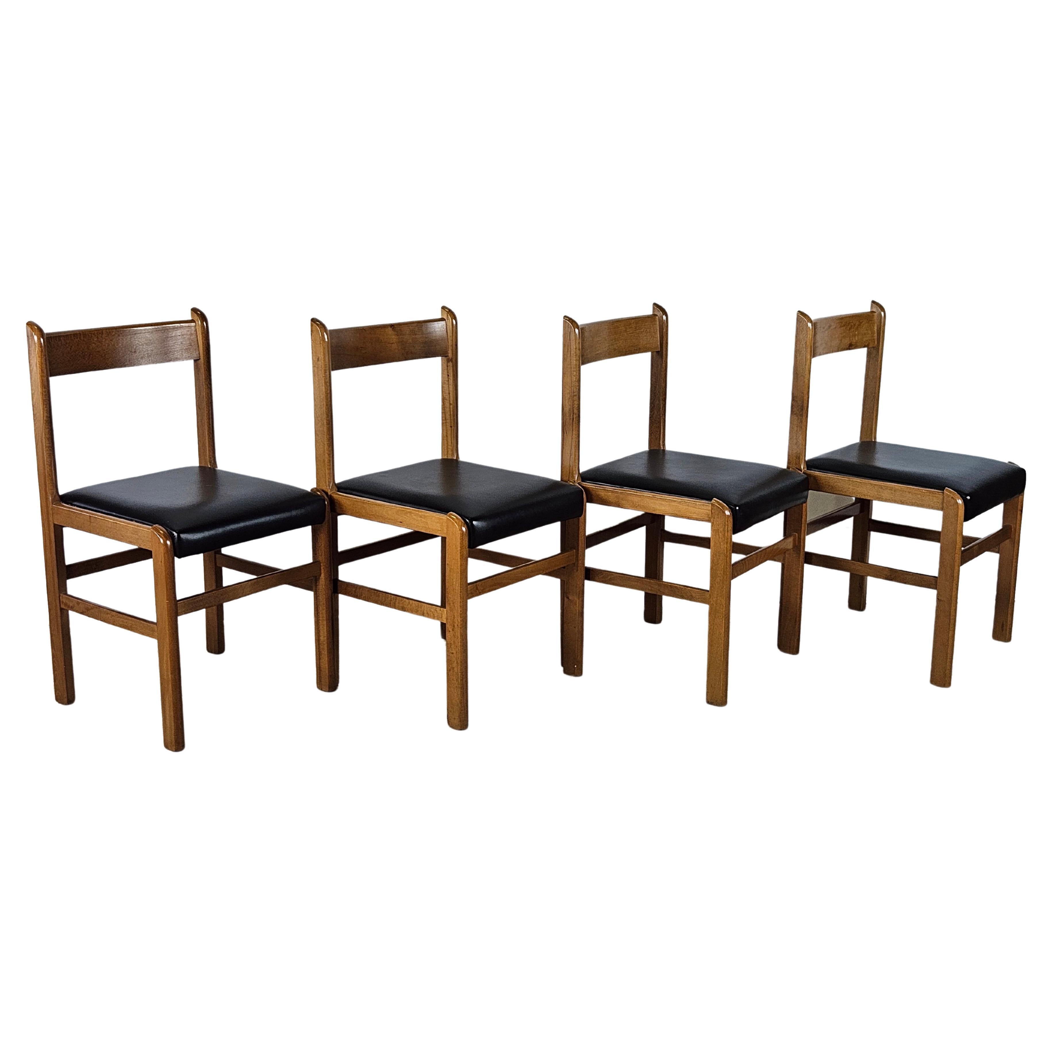 Set of four beech and leather chairs For Sale