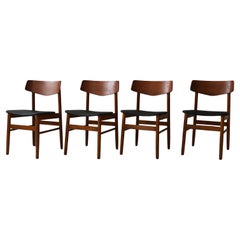 Set di quattro sedie scandinave in teak