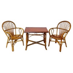 Living room set consisting of 2 armchairs and a coffee table, "Peacock," 1970s