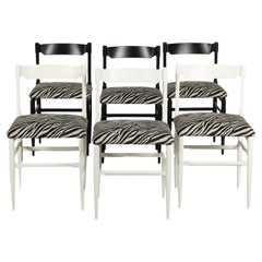 Set of six 50s-60s black and white chairs with tiger fabric