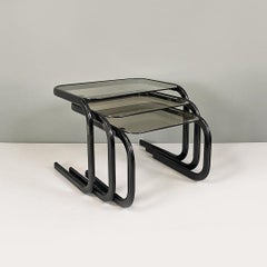 Italian modern set of black metal and smoked glass low coffee tables, 1980s