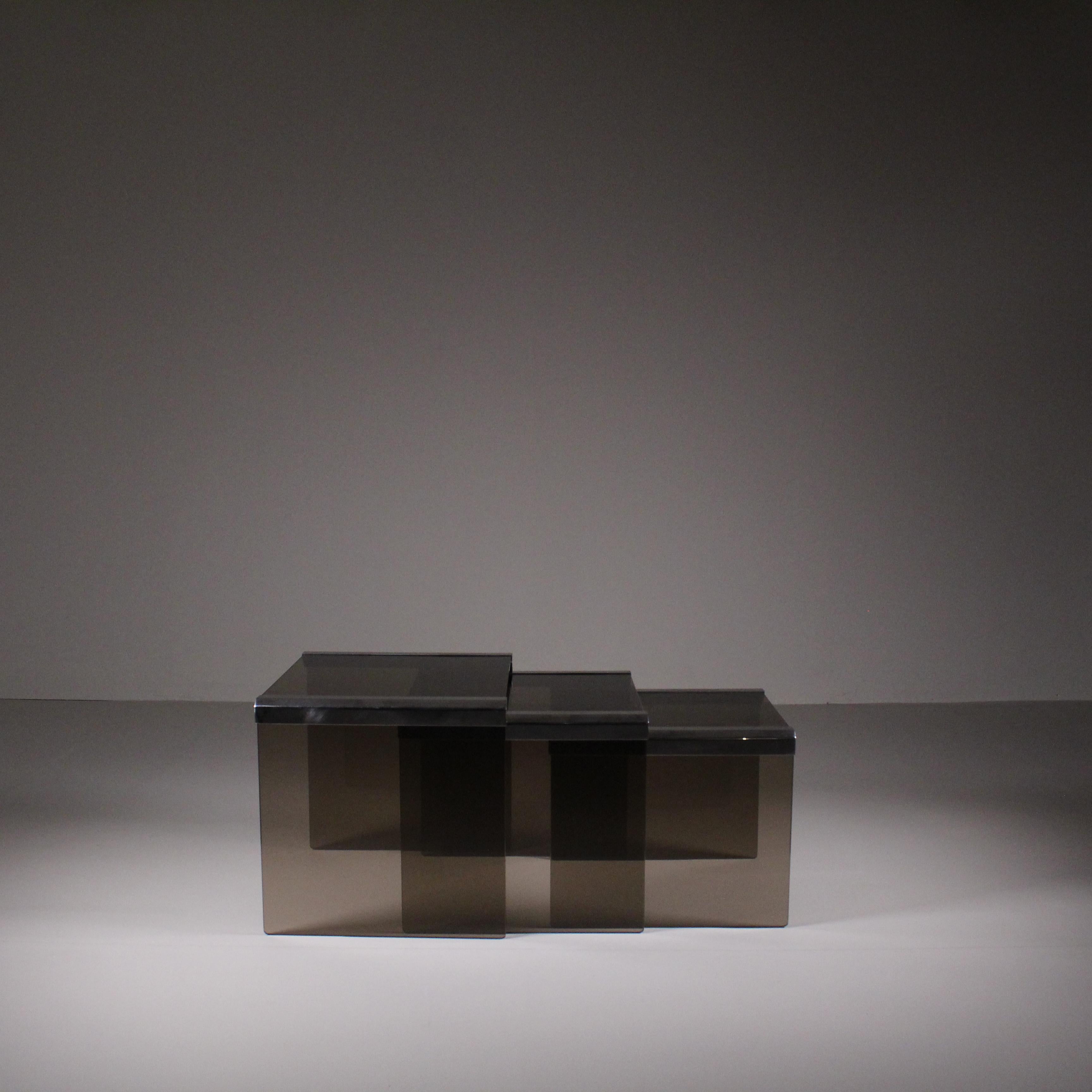 Set of 3 smoked glass nesting tables, Gallotti and Radice, circa 1970
Condition: Good, small surface marks 
Materials: Glass, Steel
