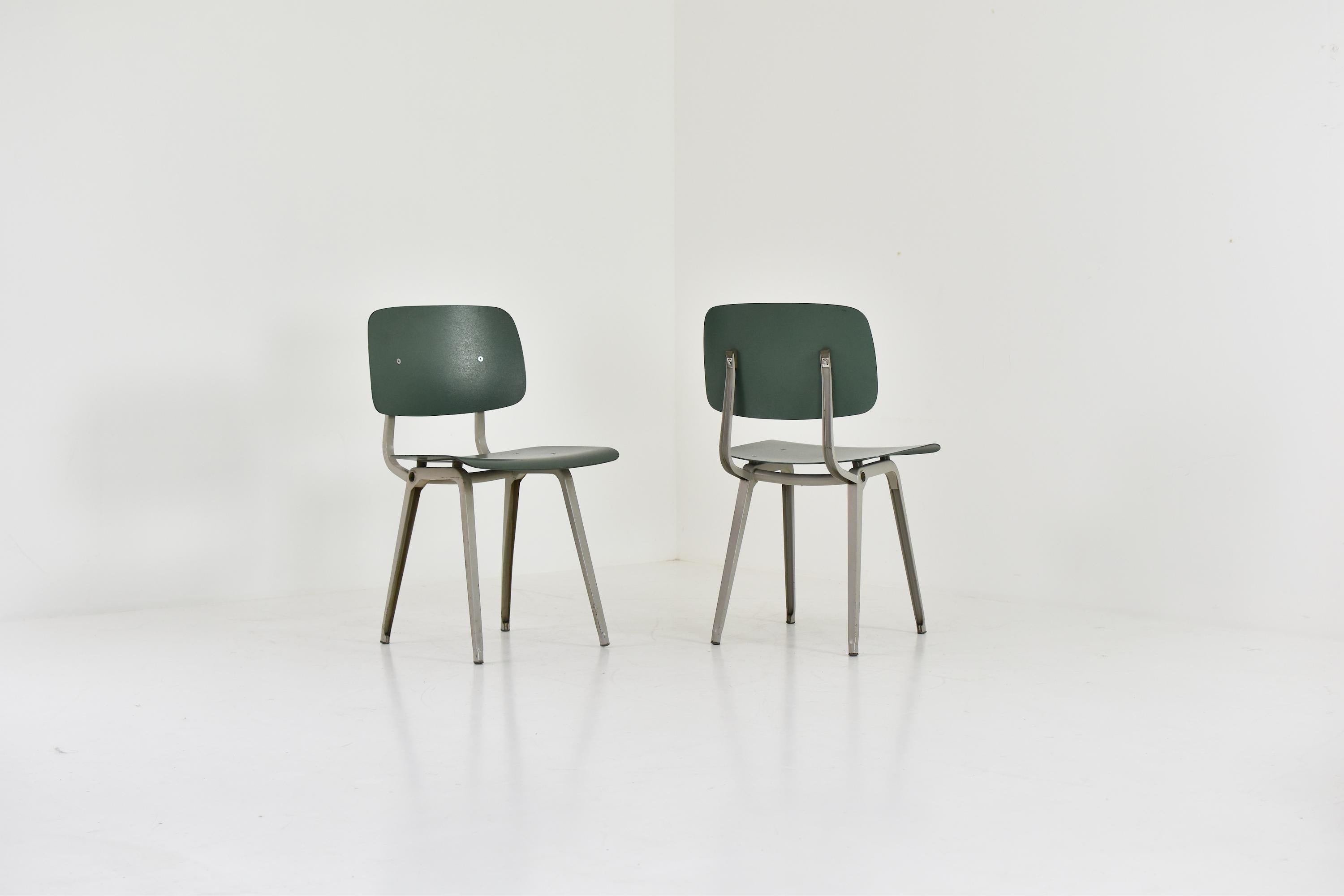 Rare set early ‘Revolt’ chairs by Friso Kramer for Ahrend de Cirkel, The Netherlands 1958. These chairs features a metal base and ciranol seats and backs. Rare colour combination in a beautifull original condition. Labeled underneath.