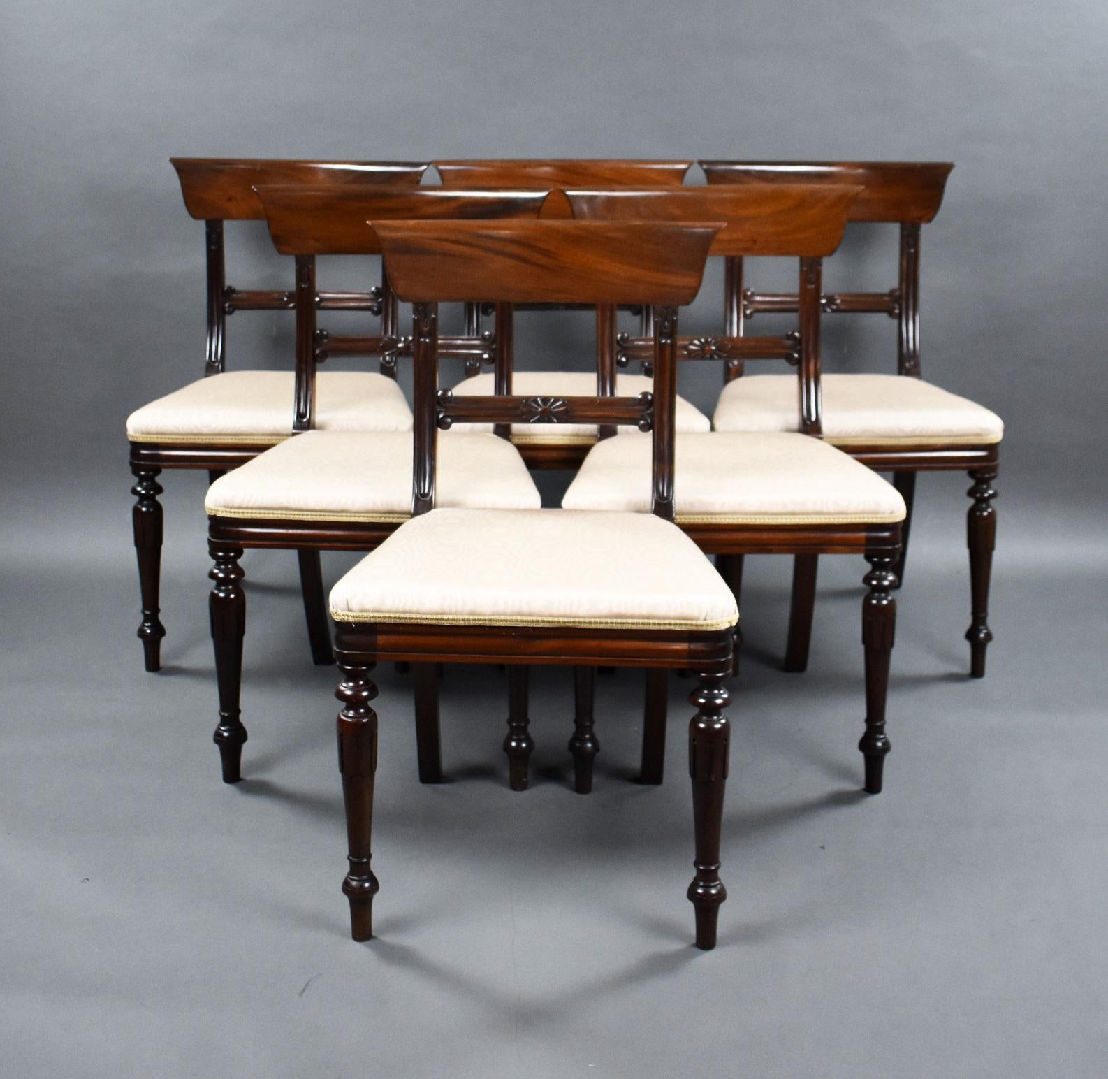 Set eight 1930s mahogany dining chairs comprising of six singles and two carver chairs in good condition having a nice curved back and standing on tapered turned legs, all structurally sound with upholstered seats.
