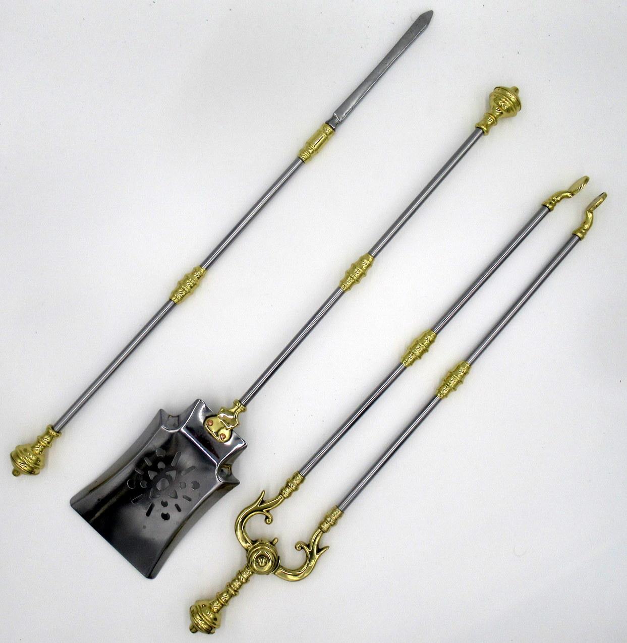 A very fine original set of early english victorian polished steel and brass fireplace fire tools of outstanding workmanship and quality. Mid Nineteenth Century. Circa 1860 

Comprising a poker, tongs and finely pierced flair tipped shovel all