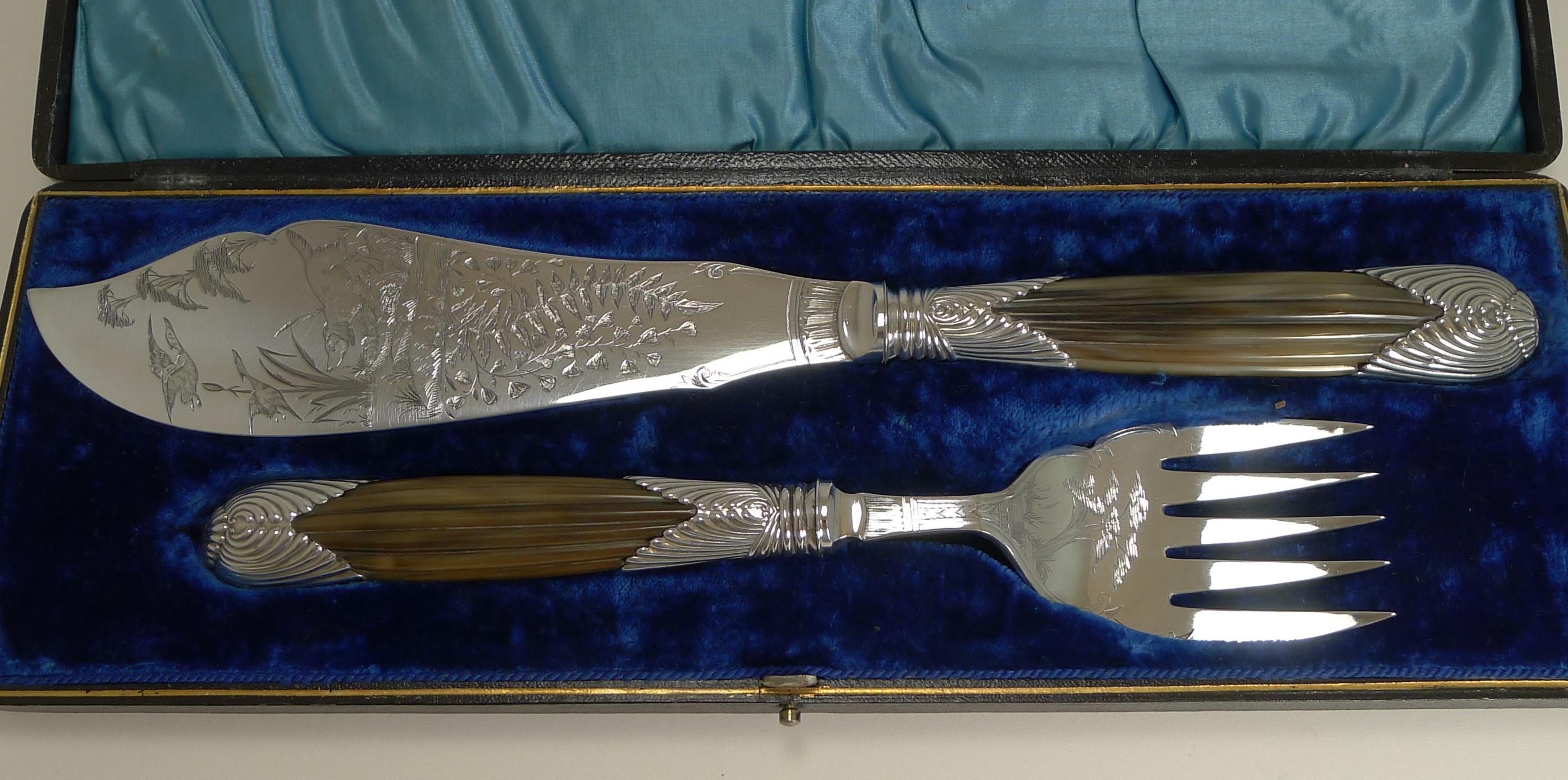 About as special as they get and something I haven't come across before. Opening the original presentation case reveals a superb pair of silver plated fish servers with hand carved handles.

One makes these highly sought-after is the beautifully