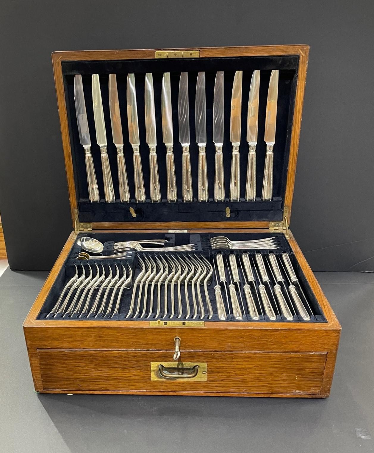 Fine, hand-forged Victorian silver cutlery set in the Bead pattern with all pieces made by one of the 19th century's finest silver cutlery makers, George Adams, in 1870. Fitted in a wooden canteen box, this silver cutlery set is in wonderful