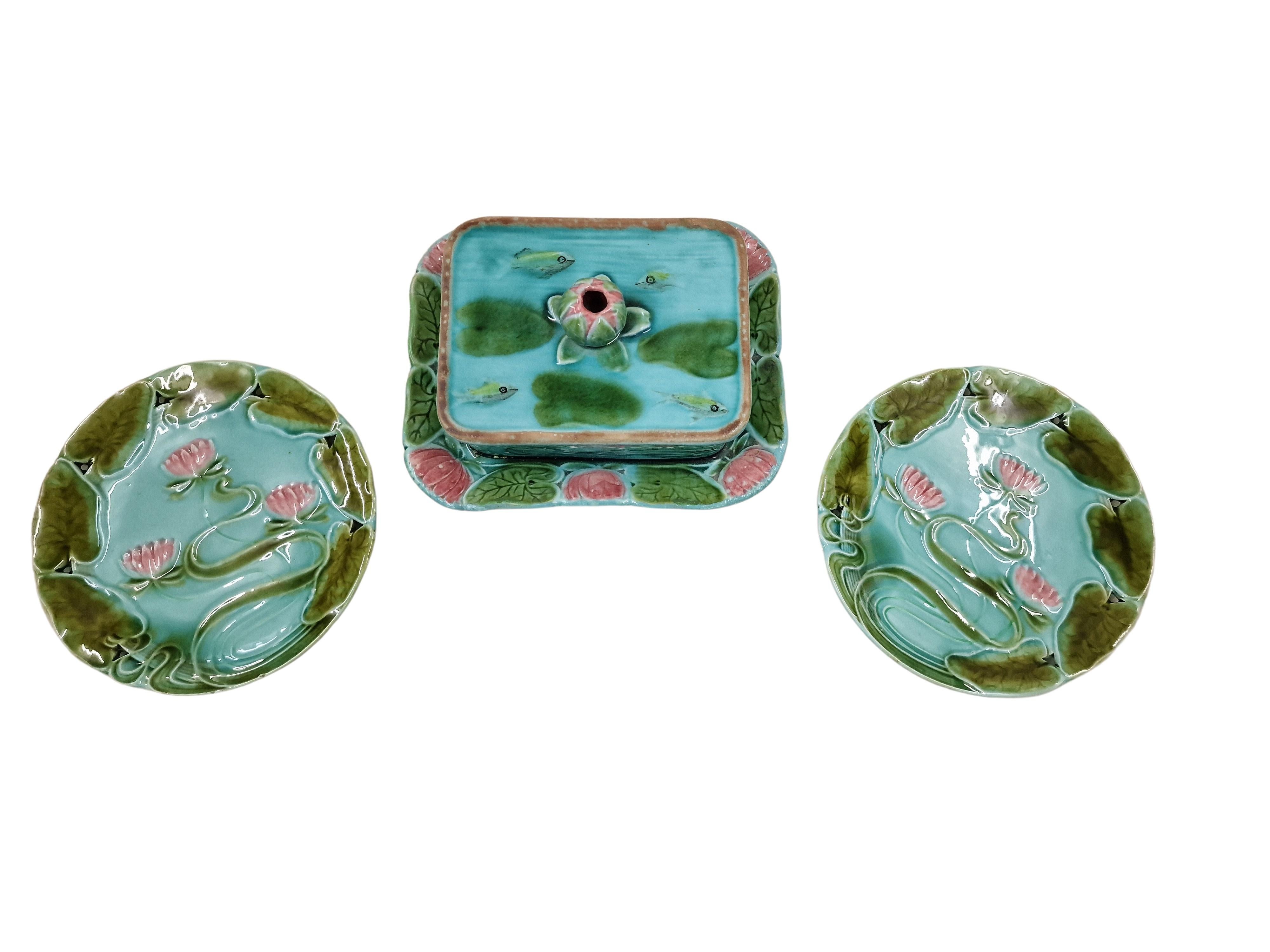 Wonderful two-person set, consisting of a butter dish and two plates. The set is made of ceramic, glazed and hand painted, of the Art Nouveau period, made around 1910, in Austria. 

The set is exceptionally beautifully designed, everything has a