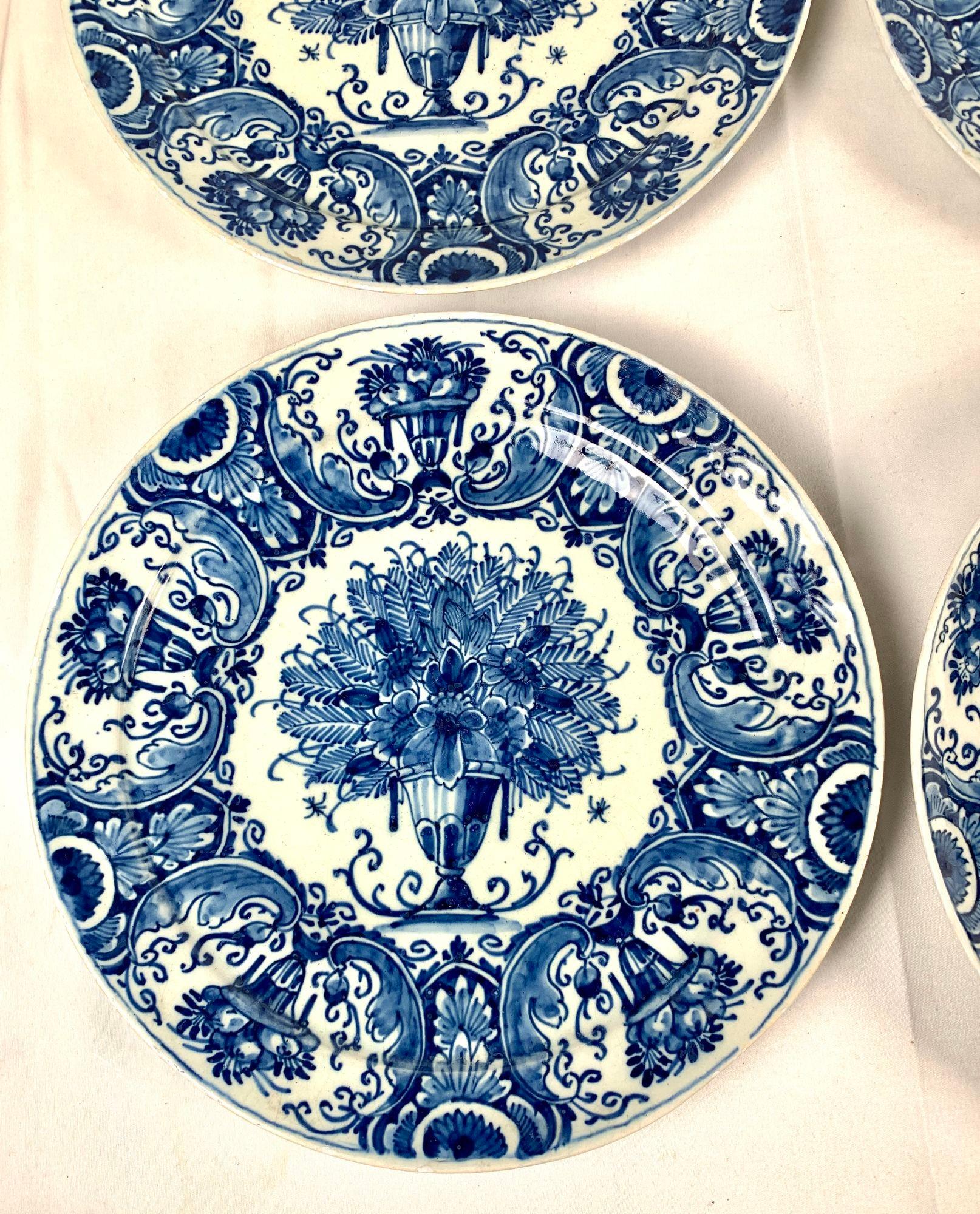 This set of four antique Delft blue and white plates was hand painted in the Netherlands circa 1760-1770.
The size of the plates is rare, somewhat larger than the more common 9