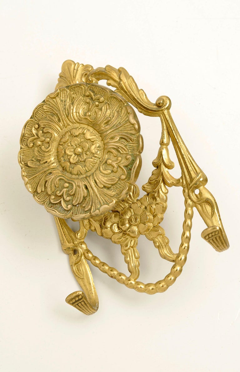 Set Four Bronze and Brass Coat Hangers For Sale at 1stDibs