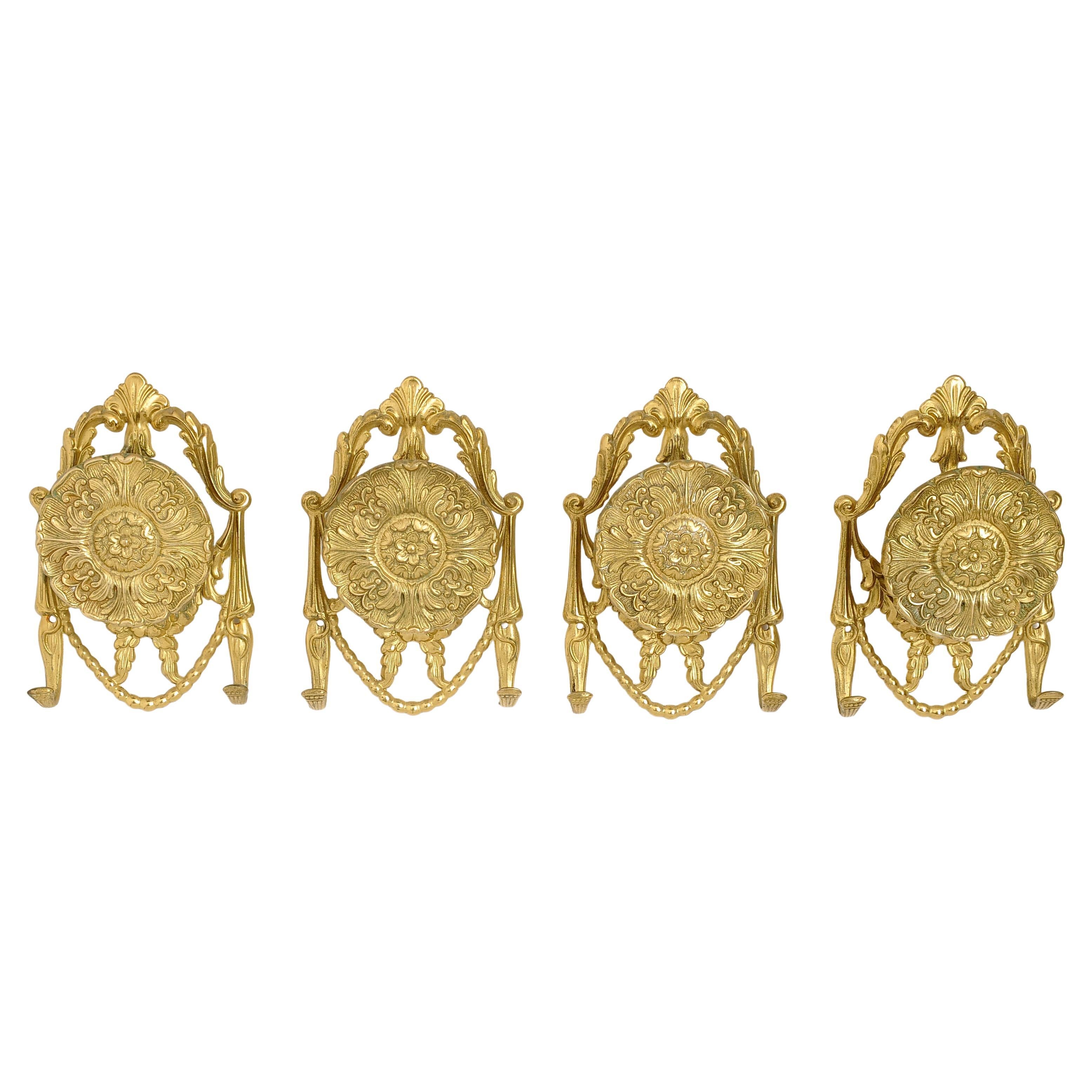 Set Four Bronze and Brass Coat Hangers For Sale