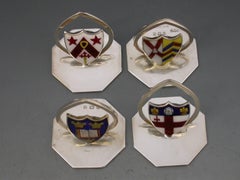 Set Four Early 20th Century Oxford University Silver and Enamel Menu Holders