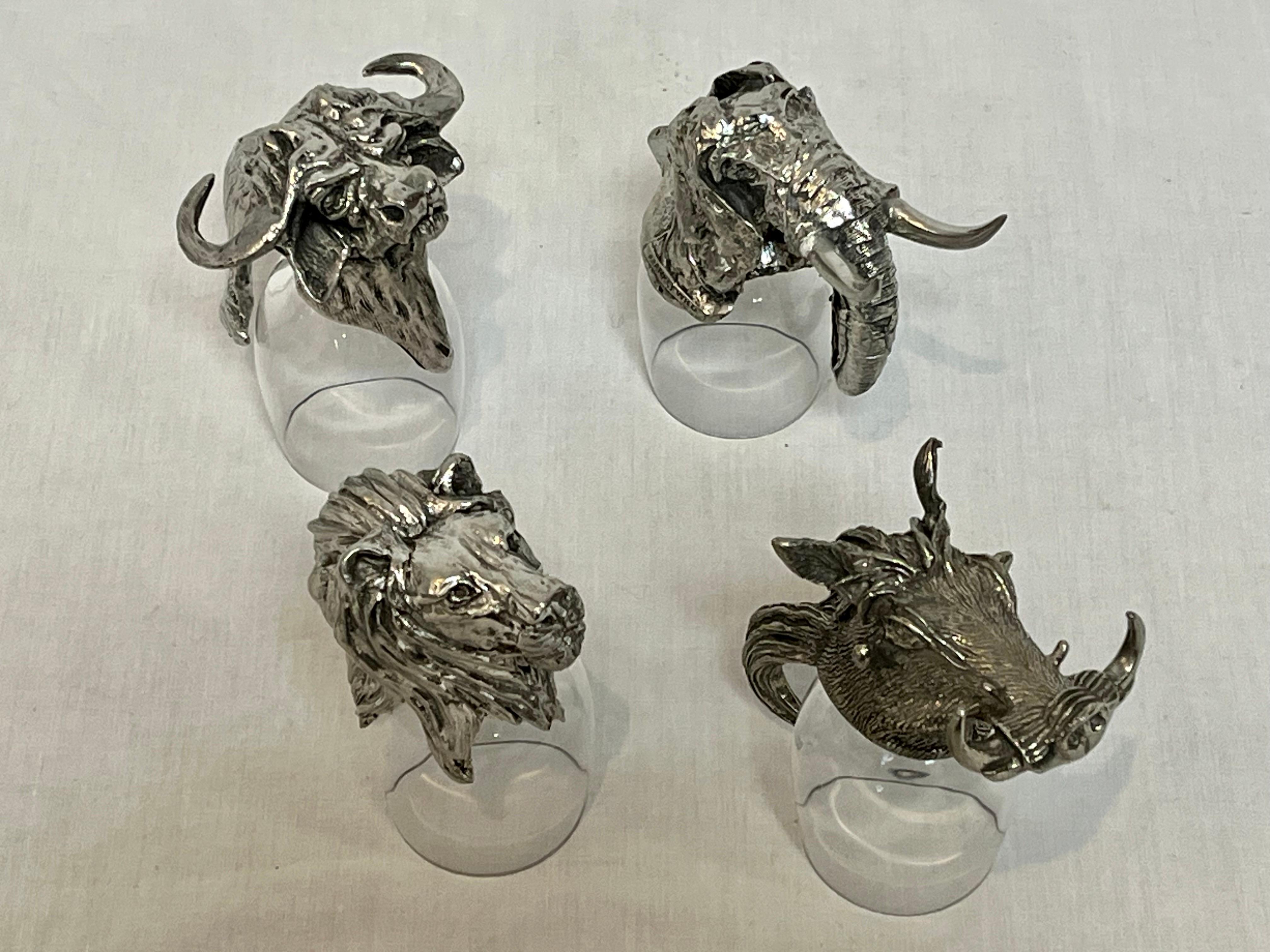 A highly detailed and exotic set of four Frankli Wild for Royal Selangor animal shot glasses. Depicting a lion, an African water buffalo, an elephant and a wild boar - these four animals come together to inspire your inner safari. The glasses /