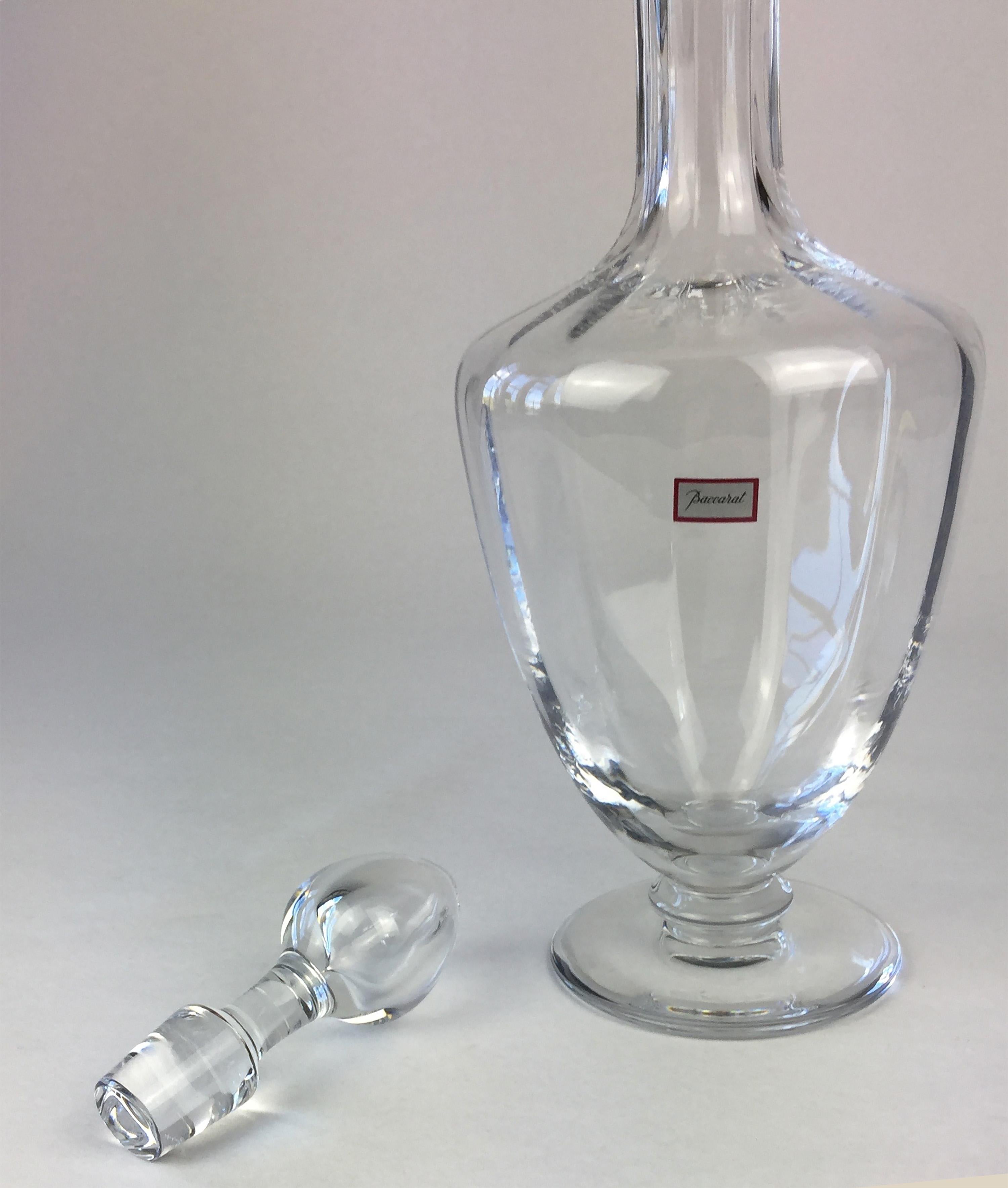 Set of four Baccarat Capris crystal identical mint condition decanters some with original labels, circa 2000 no longer in production.