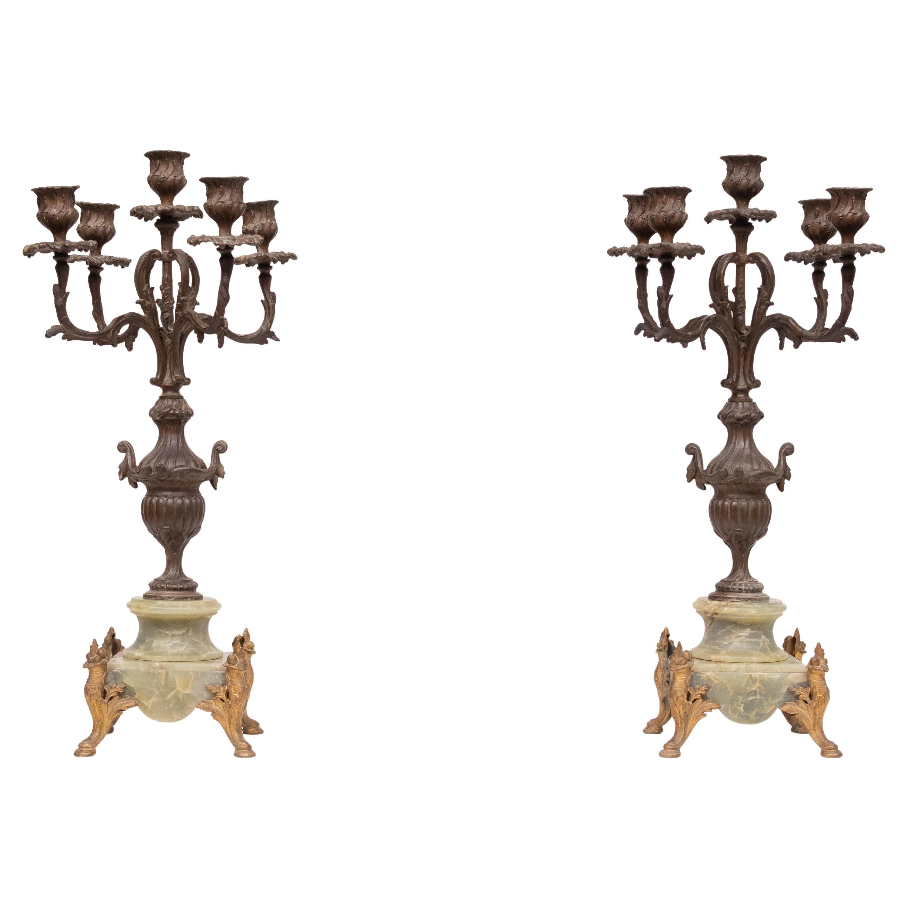 Beautiful  set of Candelabras ,Green Marble base .Gilded Brass 
corner pieces . Vase shaped body ,5 arms ,very nice ornate pieces .
1880s France . good condition .Louis  XVI in style 
Looking great on your mantle or dining table 