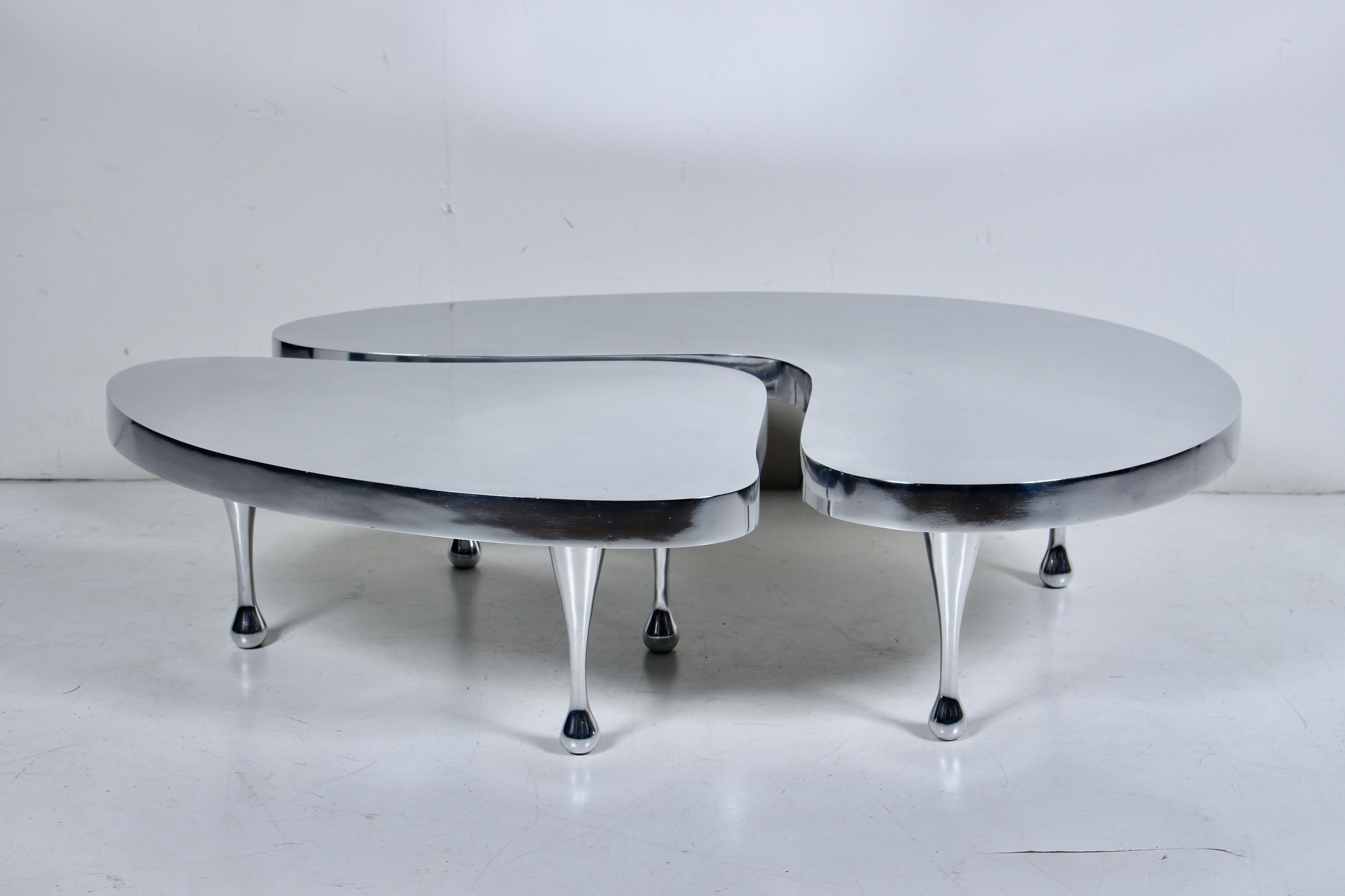 Original Palazzetti re-edition of 1935 Frederick John Kiesler designed Polished Cast Aluminum Low Nesting Coffee Table. Featuring balanced, sturdy, low, organic, free-form smoothly polished, reflective Aluminum surfaces. The two part nesting table