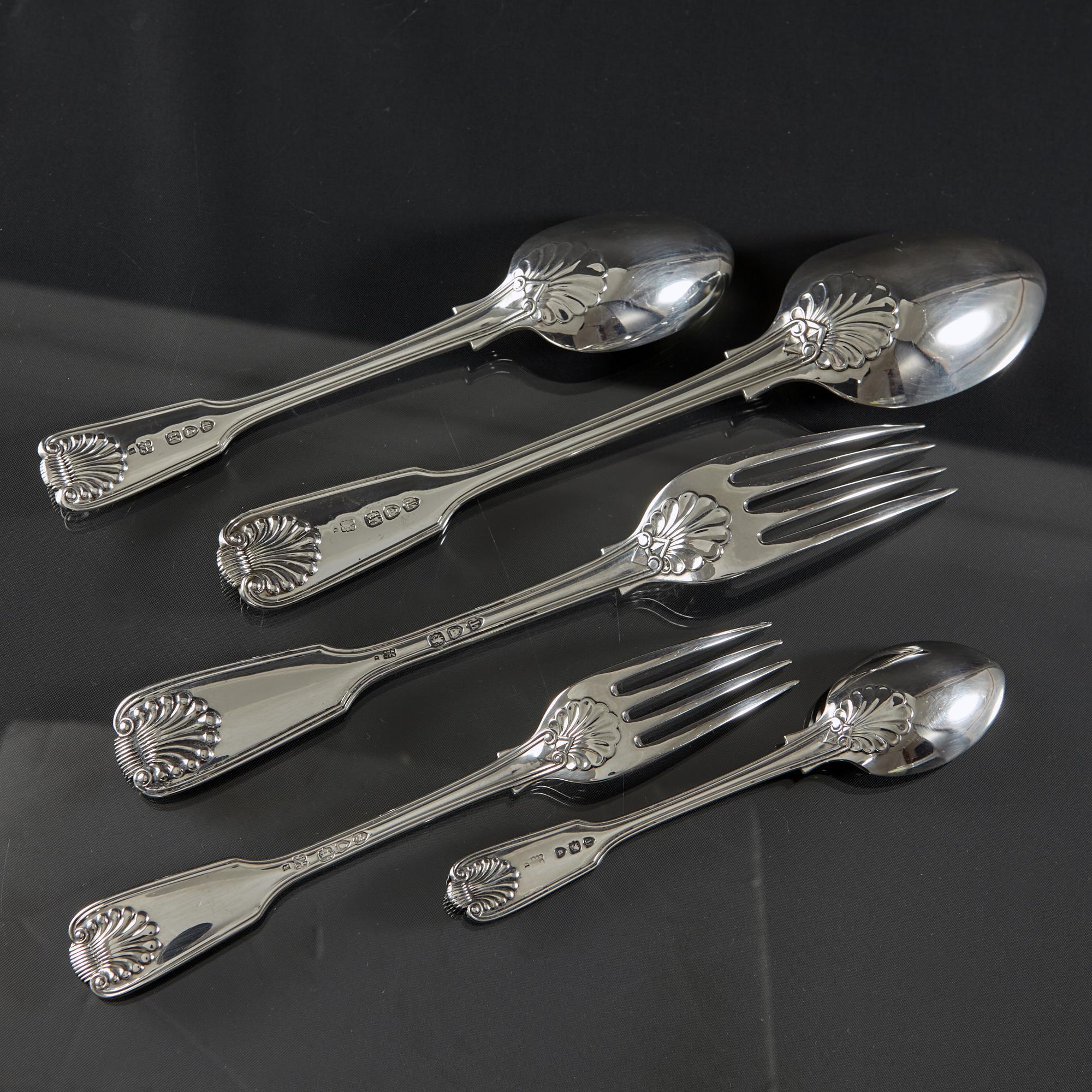 Victorian hand-forged silver cutlery set  for 12 people in the Fiddle Thread and Shell pattern.  This is a charming design featuring the classic fiddle shape, thread borders and shell motifs.   On the reverse, shells appear on the heads and heels of
