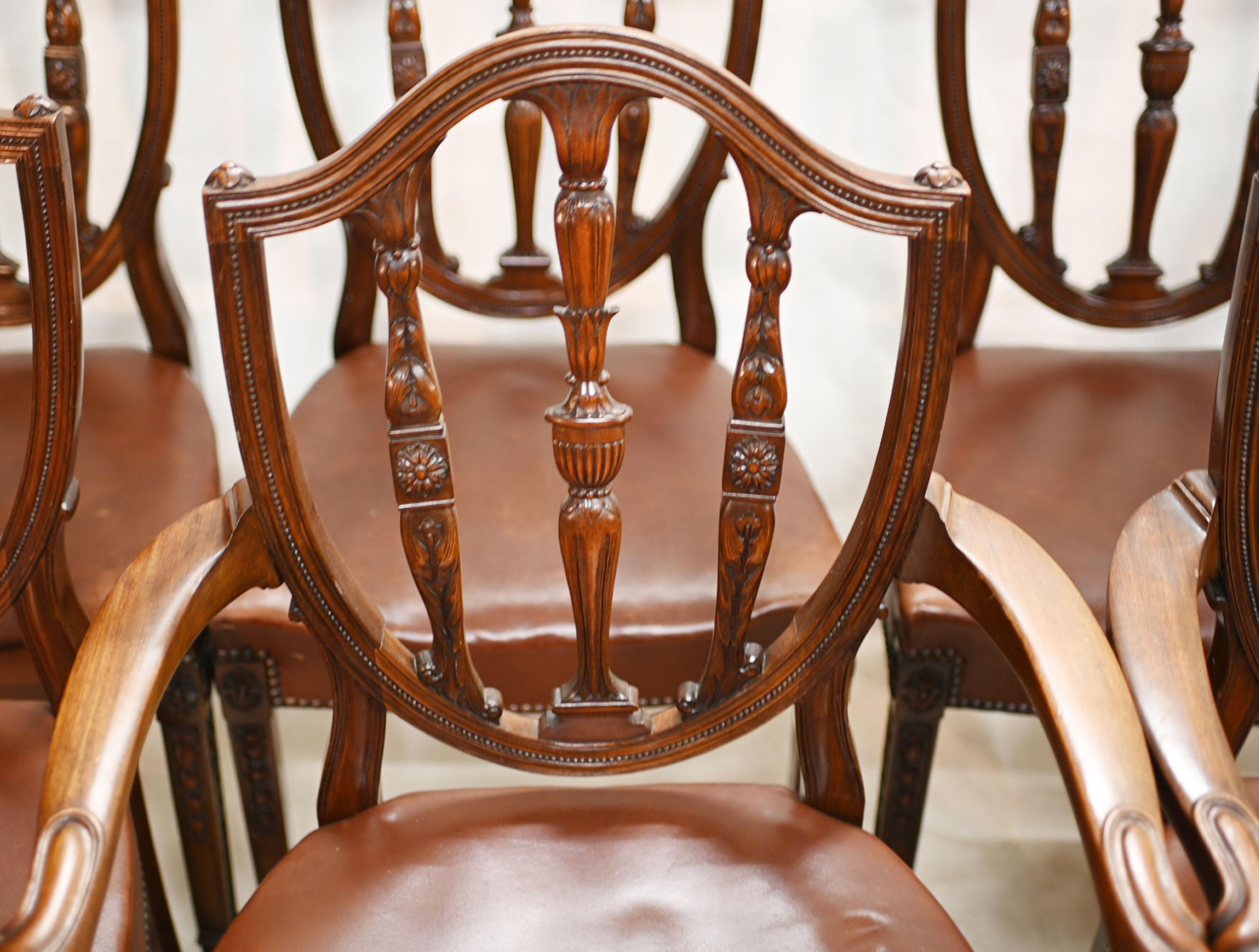 Elegant and refined set of 8 dining chairs after Hepplewhite
Classic hand carved back rest with urn motifs and rosettes
Set of 8 chairs - including two arm chairs
We date these chairs to circa 1880
Offered in great shape ready for home use right