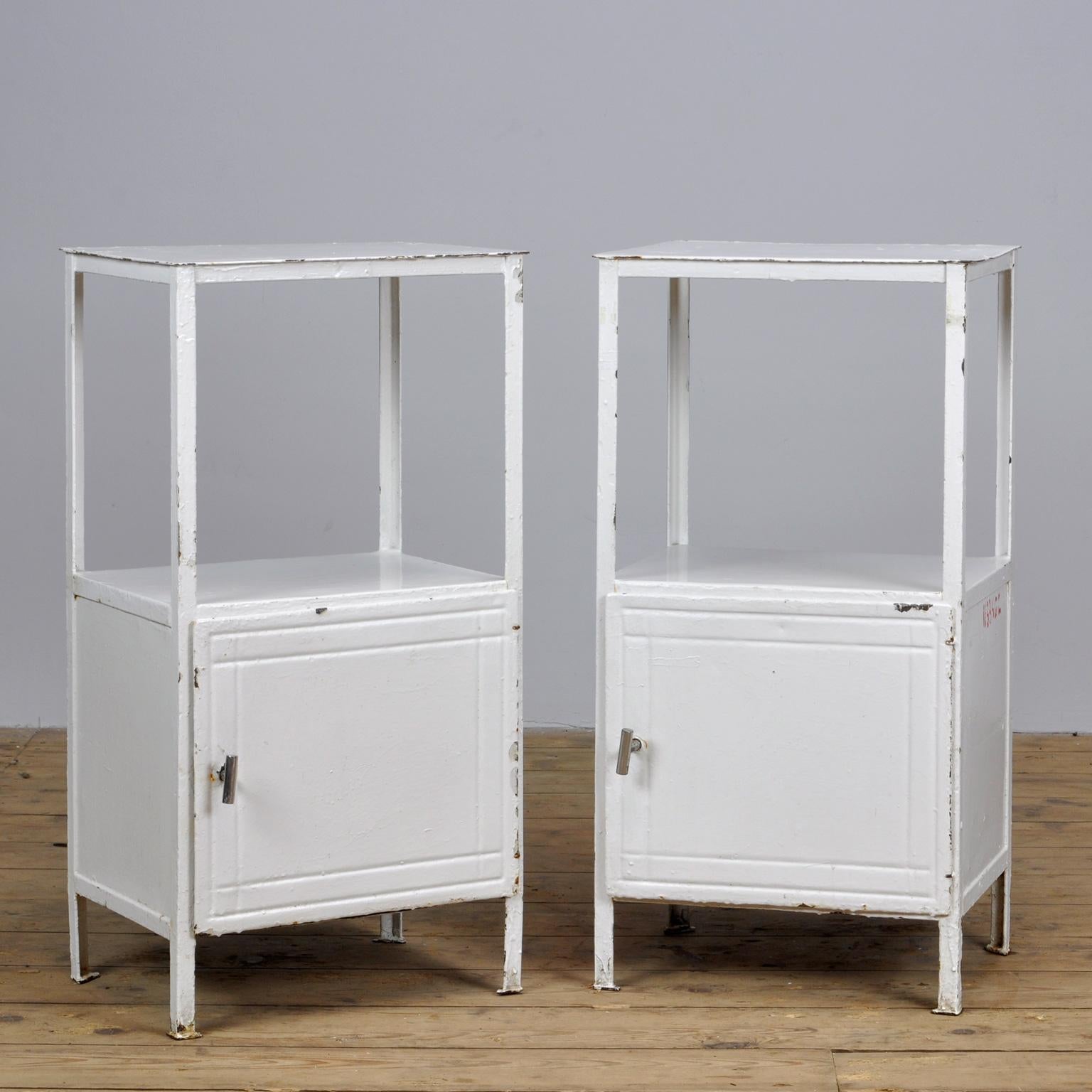 A pair of painted steel hospital bedside cabinets. East German, 1950s.
Price is for the pair.