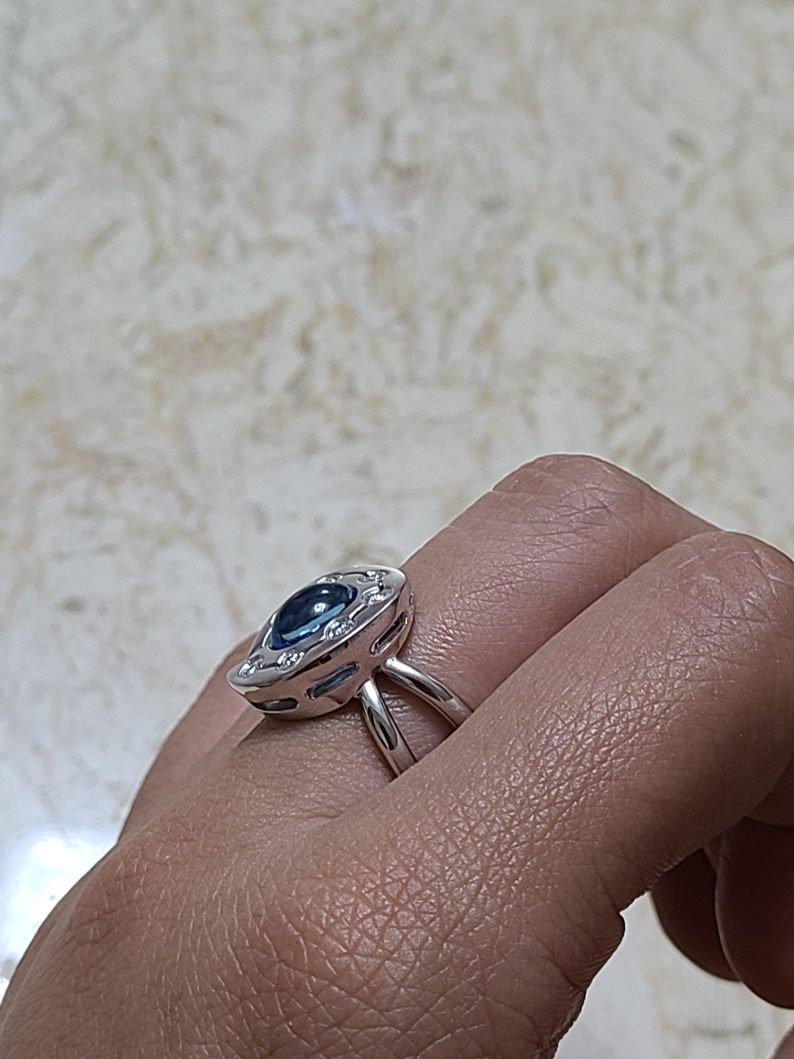 Women's 18 Karat Gold Blue Topaz Cabochon with Diamond Ring For Sale