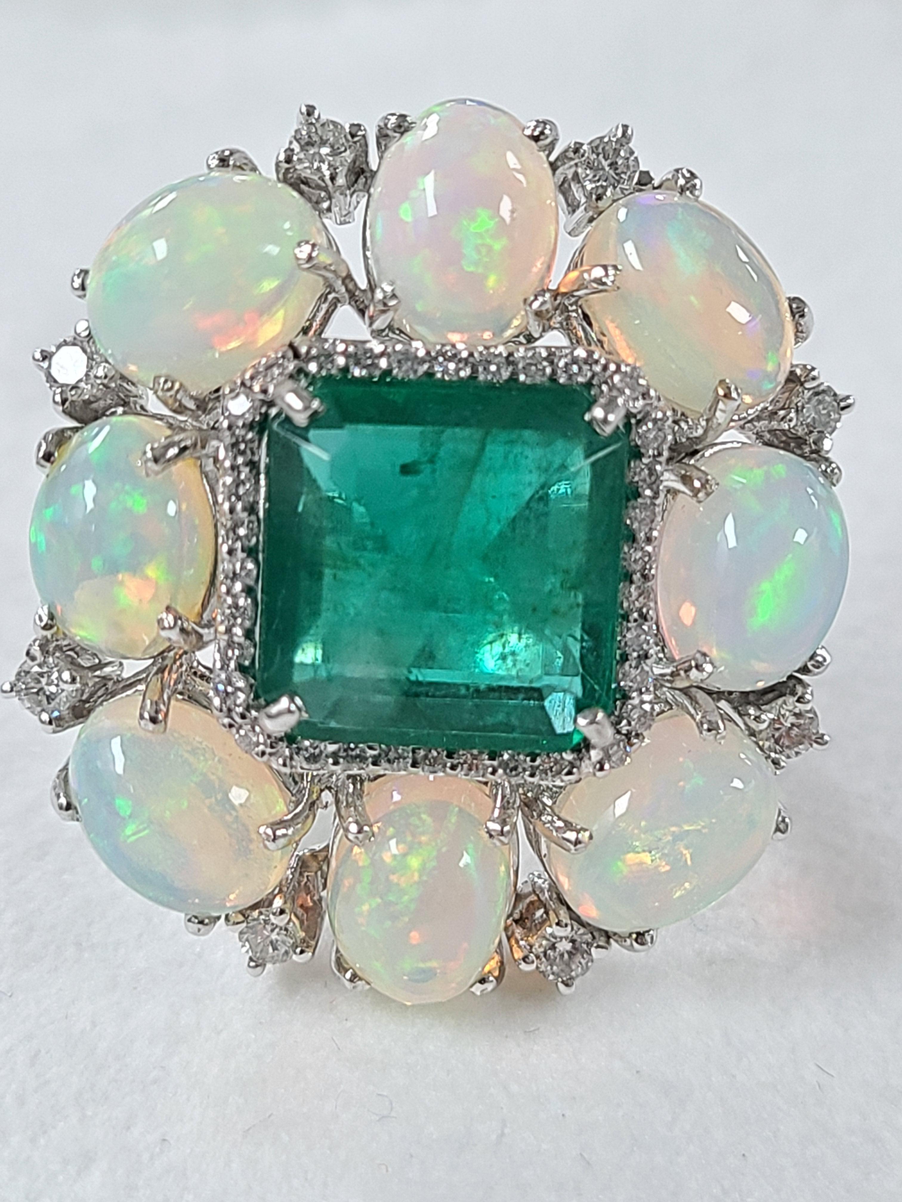 Emerald Cut Set in 18 Karat Gold, Ethiopian Opal, Zambian Emerald and Diamond Cocktail Ring