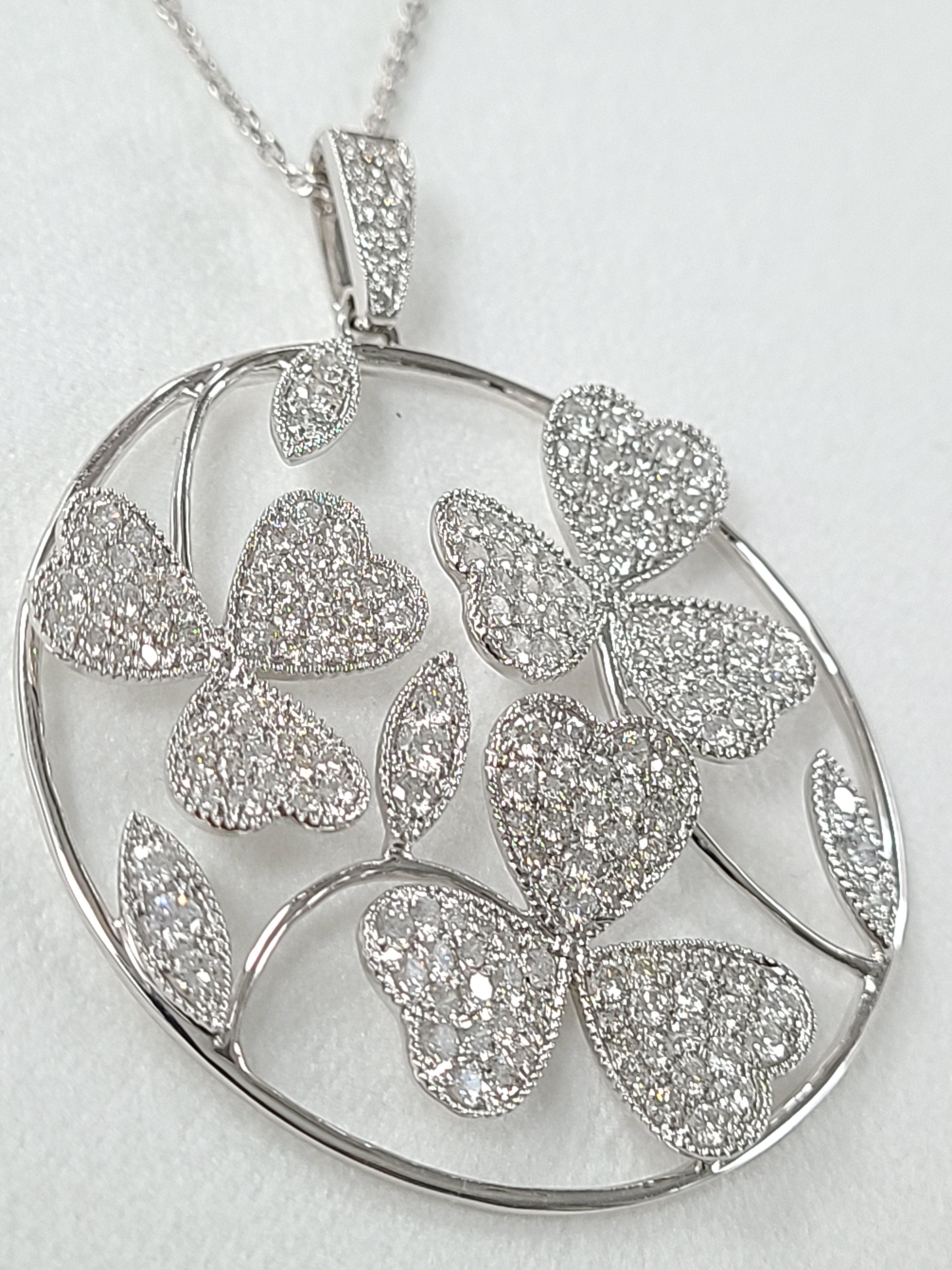 A gorgeous Diamond pendant made with high quality Craftsmanship ! The pendant is made in such a way that it gives sort of a 3D look . The diamond weight in the pendant is 2 carats . The chain's length can be changed with a simple ball mechanism .