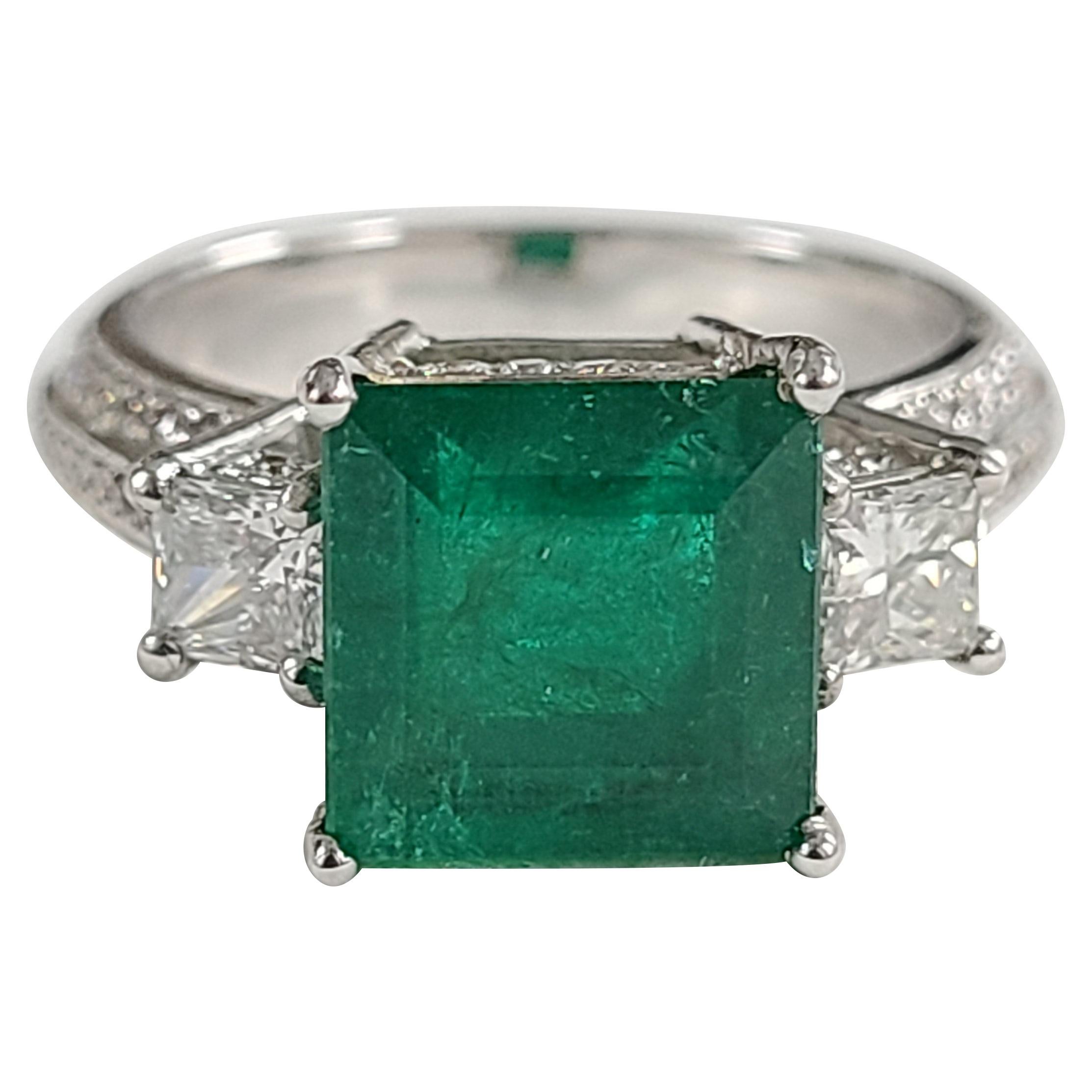 Set in 18 Karat Gold, Square Zambian Emerald and Princess Diamonds Ring