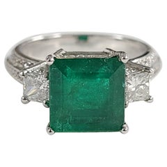 Set in 18 Karat Gold, Square Zambian Emerald and Princess Diamonds Ring