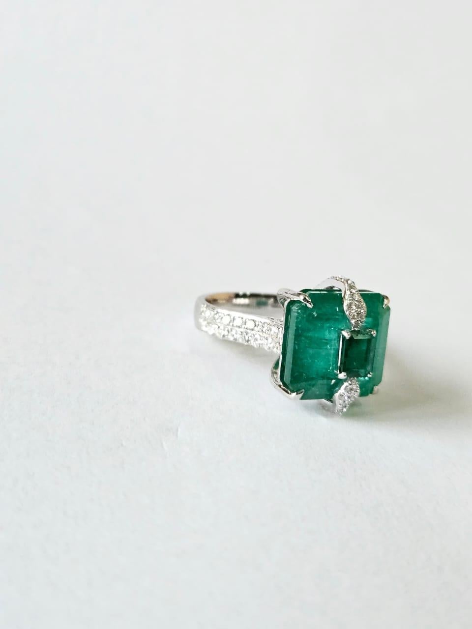 Emerald Cut Set in 18K, 11.56 carats, natural Zambian Emeralds & Diamonds Engagement Ring For Sale