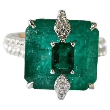 Set in 18K, 11.56 carats, natural Zambian Emeralds & Diamonds Engagement Ring