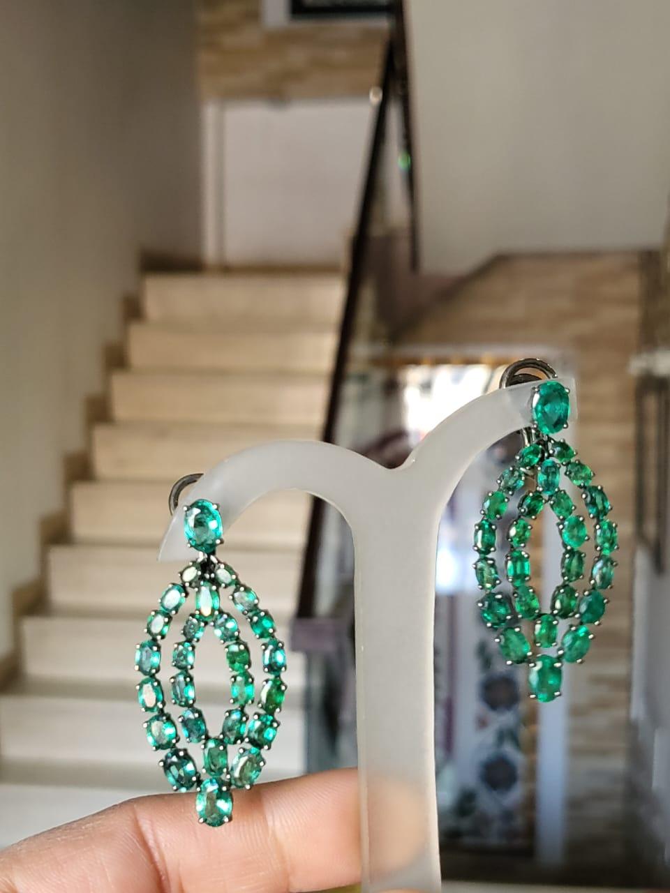Oval Cut Set in 18k Black Gold, 12.54 Carats, Natural Zambian Emerald Dangle Earrings For Sale