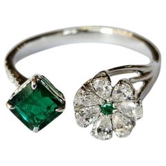 Set in 18K Gold, 0.57 carats, natural Zambian Emerald & Diamonds Engagement Ring