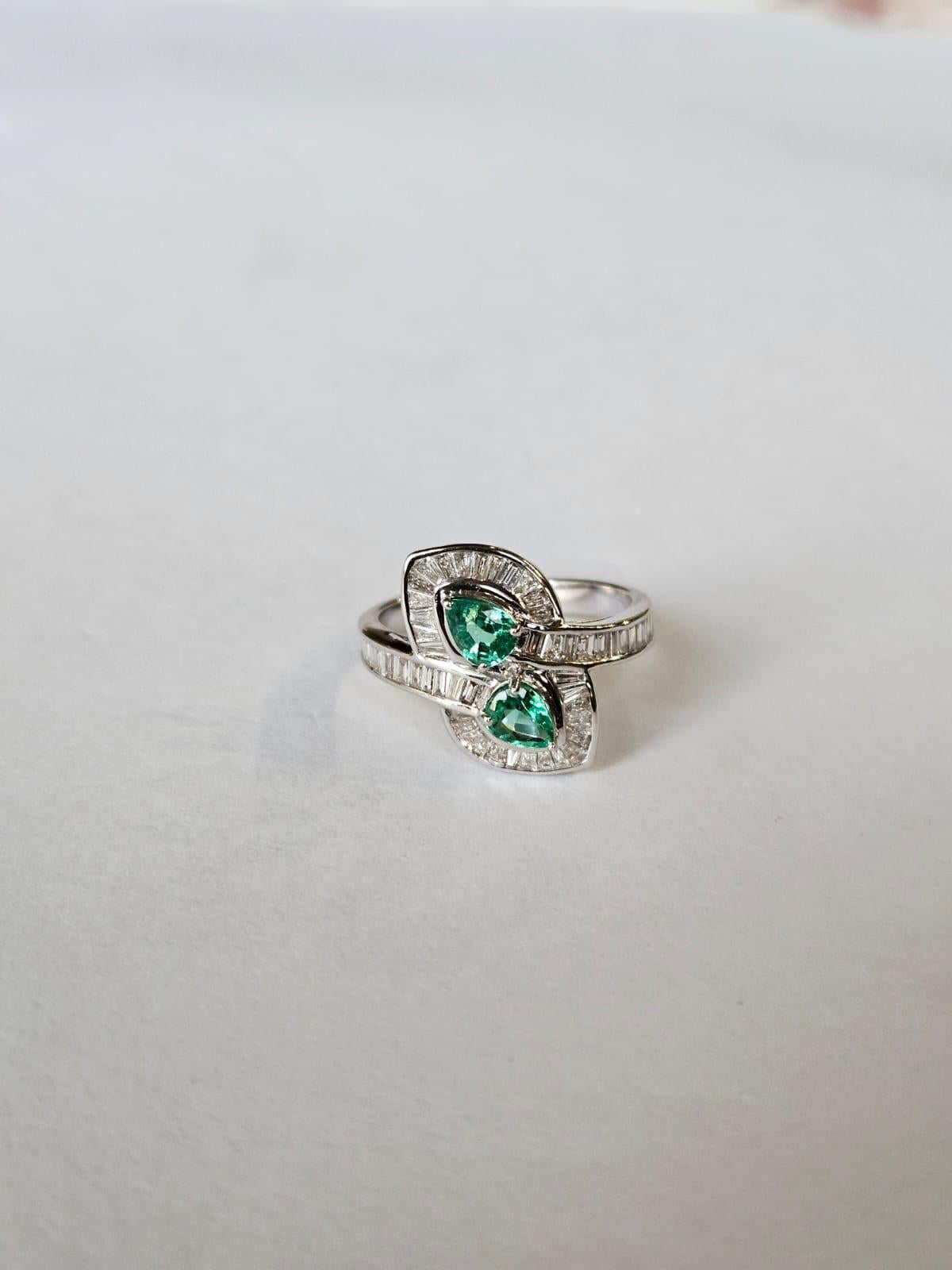 Set in 18K Gold, 0.60 carats, Zambian Emerald & Tapered Diamonds Engagement Ring In New Condition For Sale In Hong Kong, HK