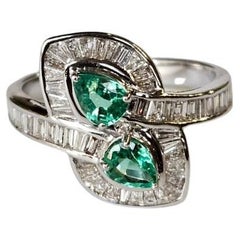 Set in 18K Gold, 0.60 carats, Zambian Emerald & Tapered Diamonds Engagement Ring