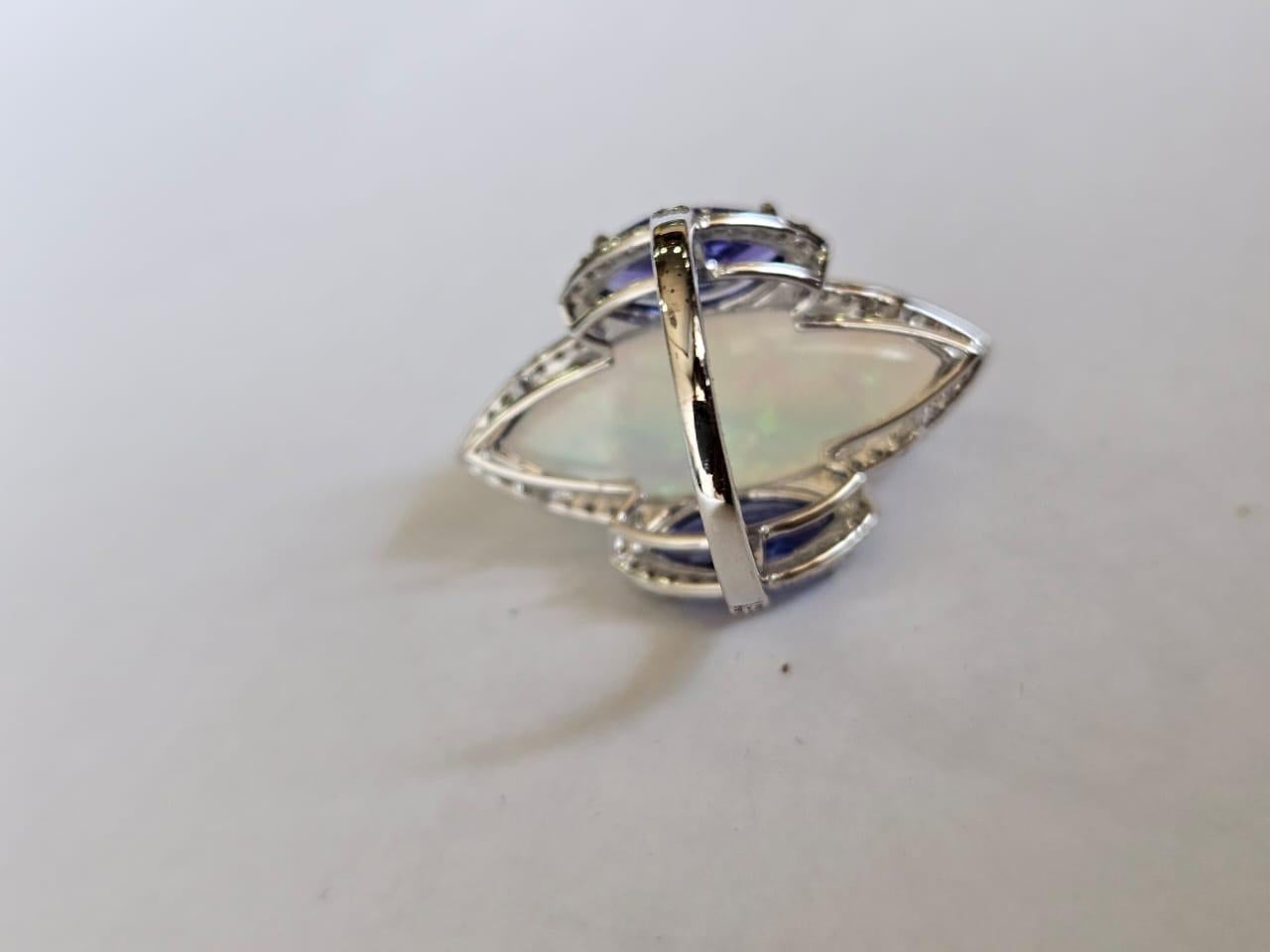 Modern Set in 18K Gold, 10.07 carats Ethiopian Opal, Tanzanite & Diamonds Cocktail Ring For Sale