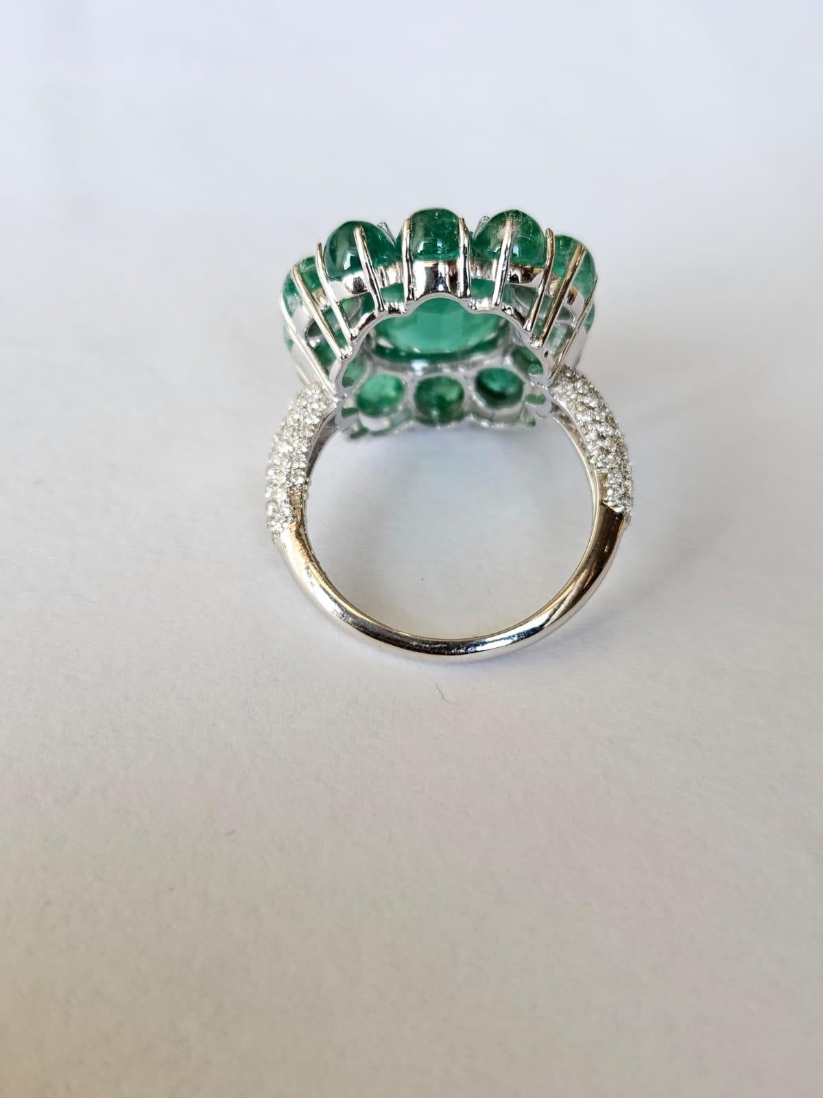 Emerald Cut Set in 18K Gold, 10.16 carats, natural Zambian Emerald & Diamonds Cocktail Ring For Sale