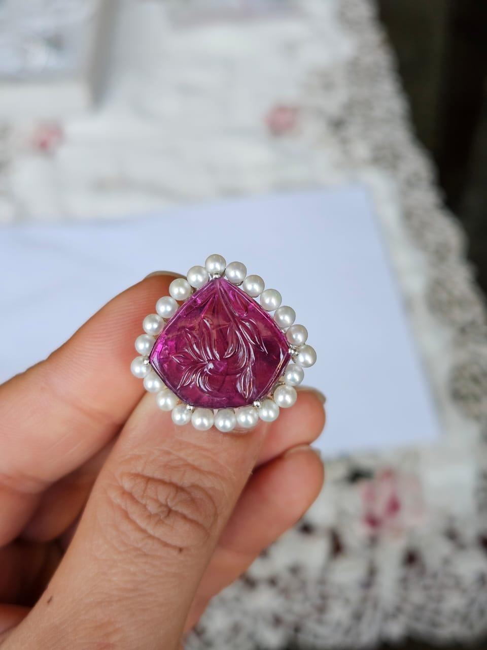 A very gorgeous and beautiful, Tourmaline & Freshwater Pearls Bridal Ring set in 18K White Gold & natural Diamonds. The weight of the carved Tourmaline is 10.67 carats. The Tourmaline is hand - carved in our very own workshop. The weight of the