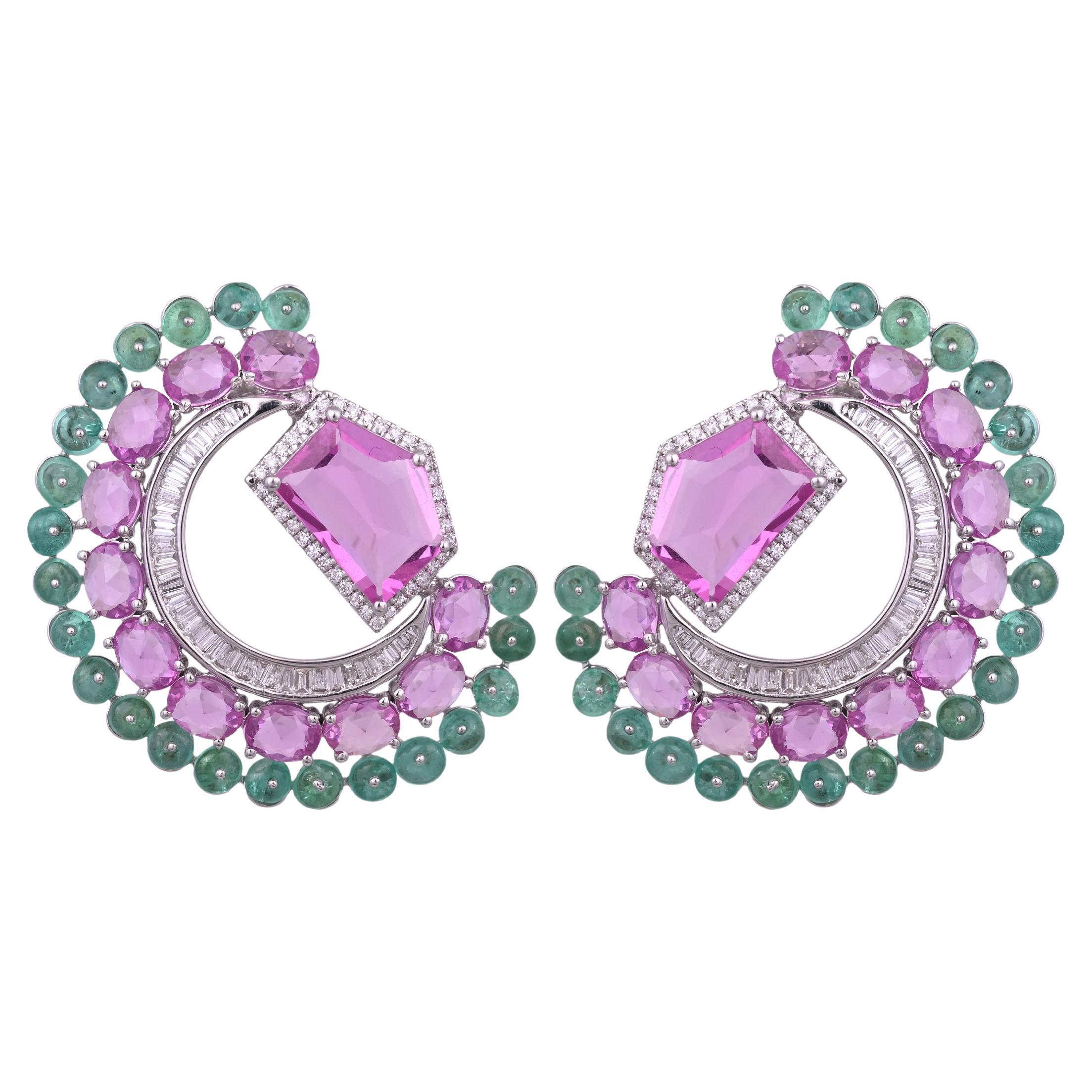 A very gorgeous and beautiful, modern style, Pink Sapphires & Emeralds, oversized Stud Earrings set in 18K White Gold & natural Diamonds. The combined weight of the Pink Sapphires is 11.33 carats. The Pink Sapphires are of Ceylon (Sri Lankan)