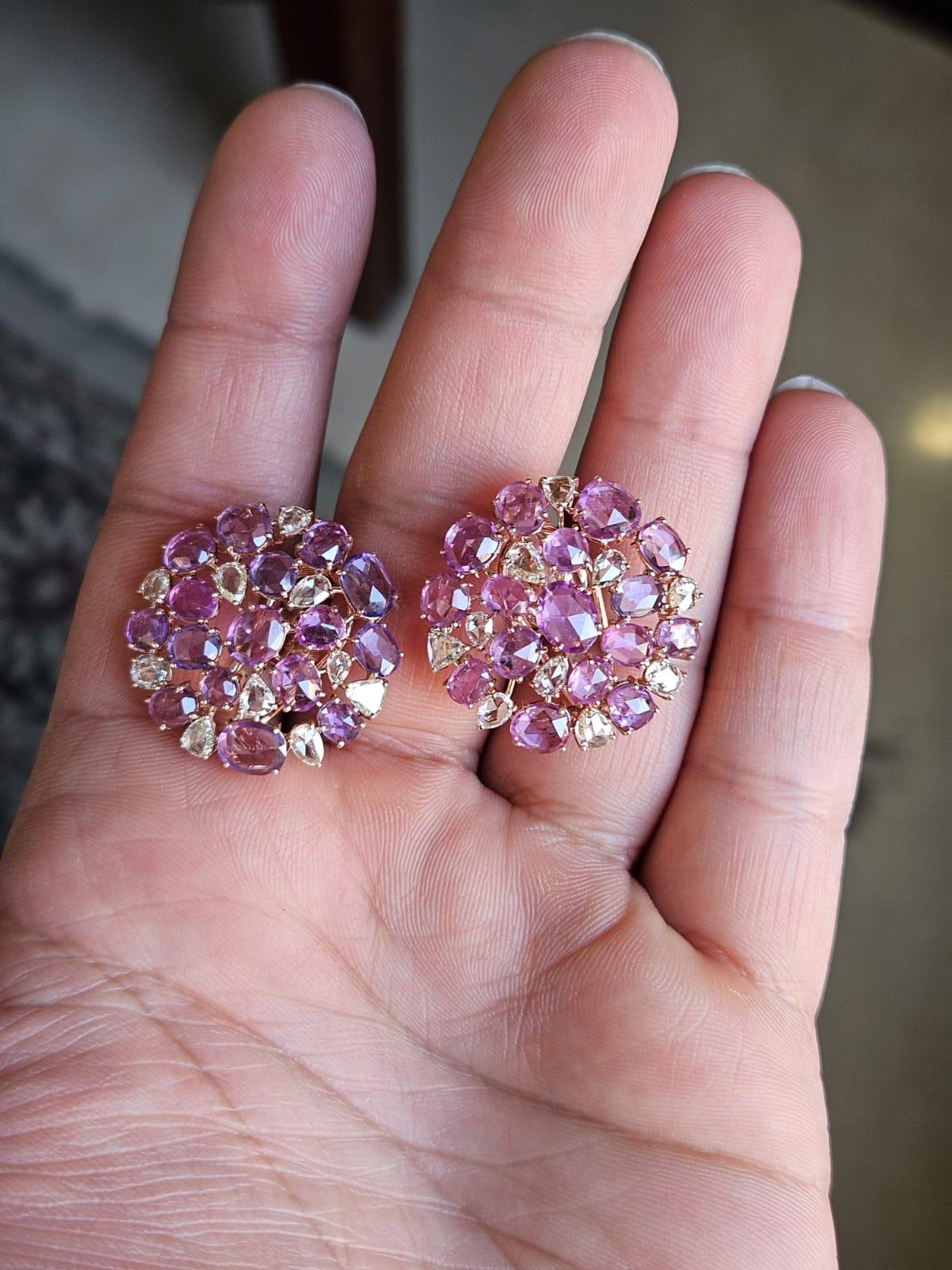 A very gorgeous and one of a kind, Multi Sapphires Stud Earrings set in 18K Rose Gold & Diamonds. The weight of the Multi Sapphires is 11.74 carats. The Multi Sapphire are of Ceylon (Sri Lanka) origin. The weight of the Rose Cut Diamonds is 1.90
