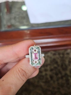 Set in 18K Gold, 11.76 carat Aquamarine, Pink Sapphire & Diamond Engagement Ring